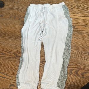 white sweatpants with cheetah print on side size small